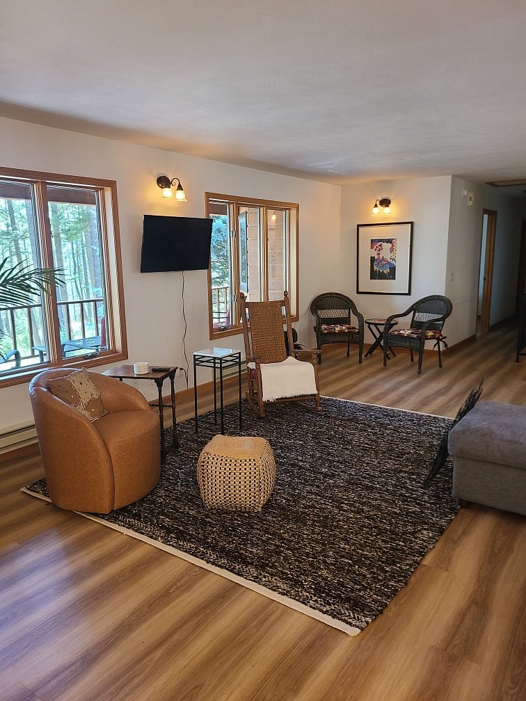Living room with ample seating, Smart TV, and gorgeous views. Home i 