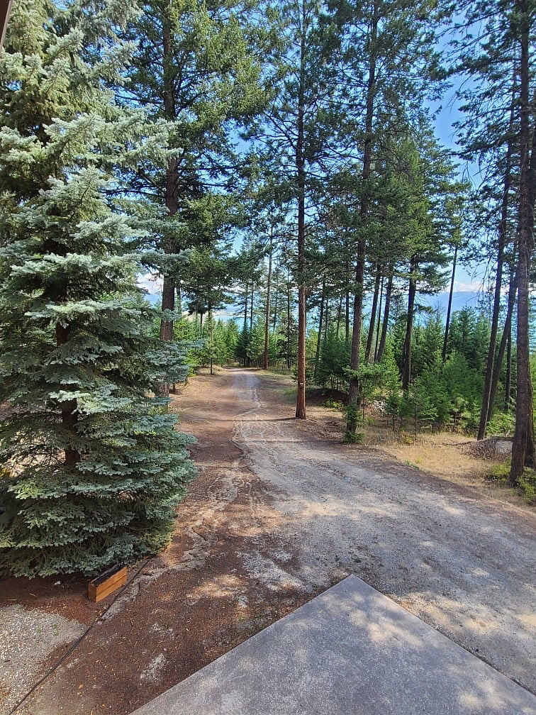 Property is accessed off of Highway 93 and has a long driveway that can be gated. Enjoy the views of Flathead Lake! 