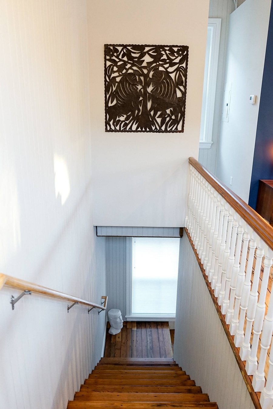 Two story townhouse style layout. ll hardwood floors, grip socks recommended for safety