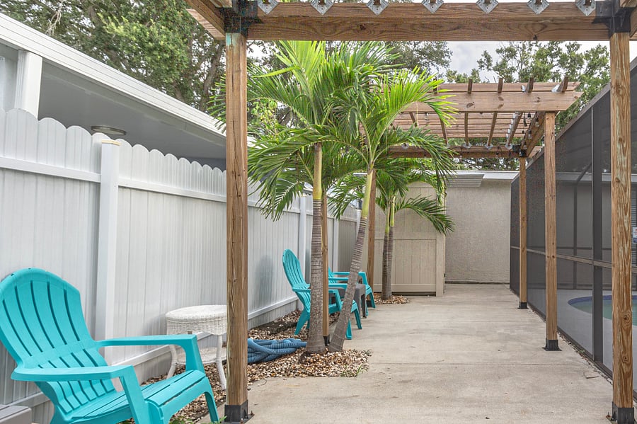 Entrance into the unit is down the side patio walkway and to the right.