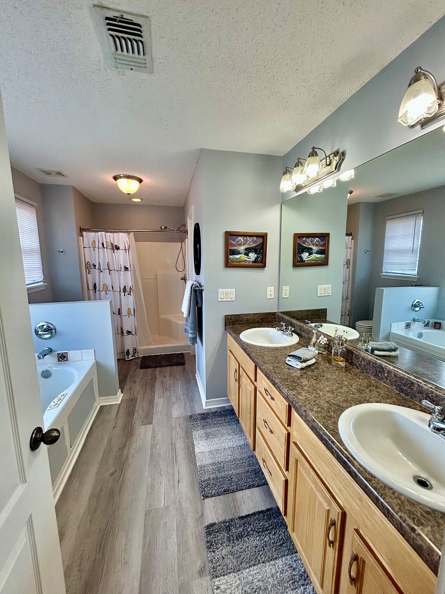 Master suite, bath, large, walk-in shower, and Jacuzzi tub.