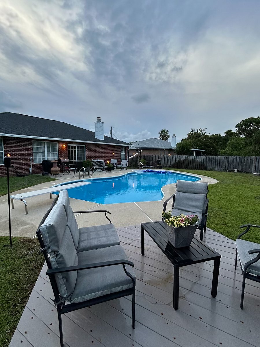Backyard features pool and relaxing Zen Garden.