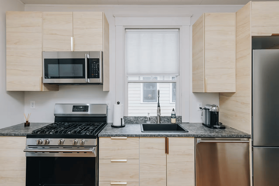Modern kitchen cabinets and new stainless steel appliances