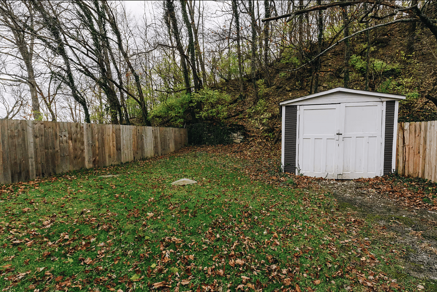 Backyard with a fence in yard for privacy