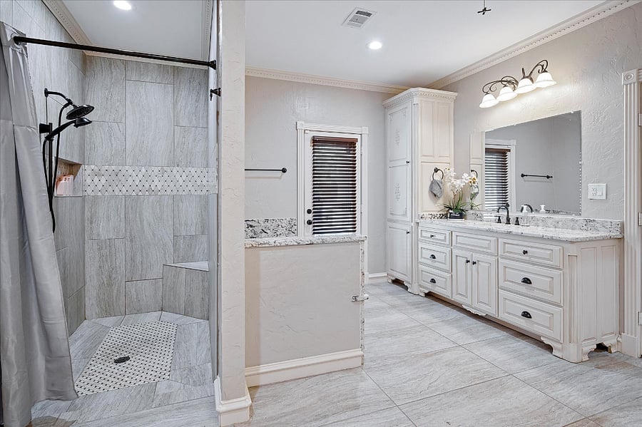 Spacious walk-in shower designed for a comfortable and refreshing experience.

