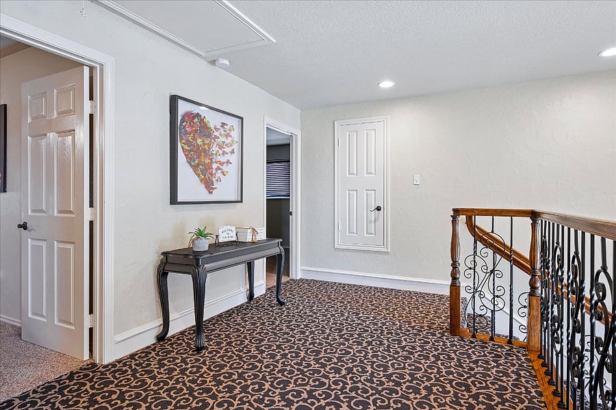 Upstairs landing with open access to all surrounding rooms.