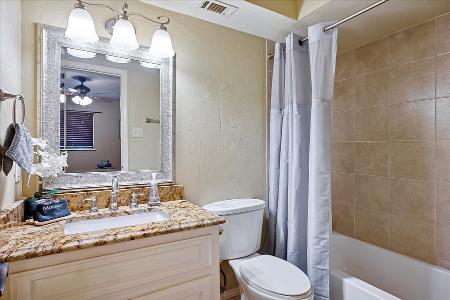 Private full bathroom with a combination shower and bathtub for added comfort and convenience