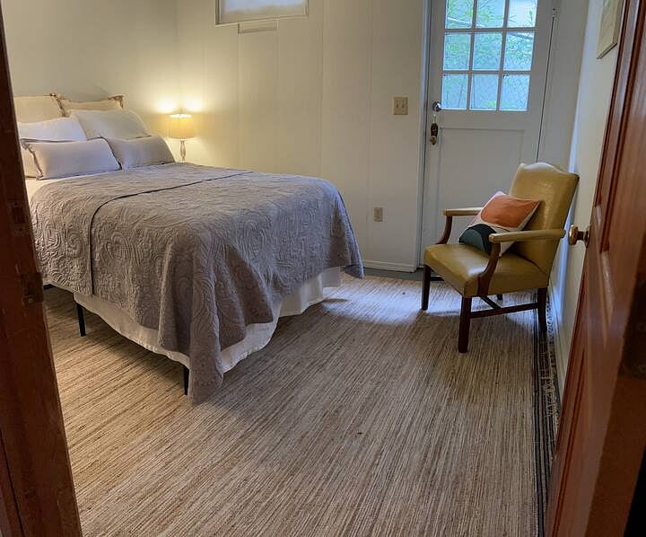 The second, smaller bedroom has a full-size bed