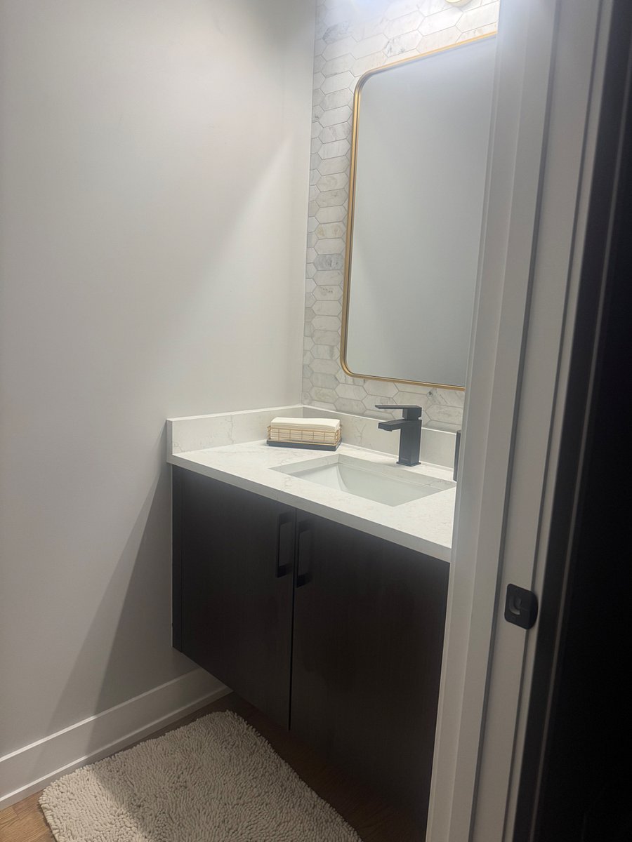 Half Bath off Kitchen and living room
