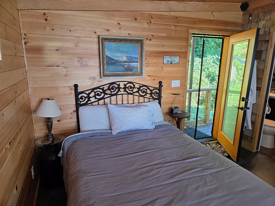 Bedroom #2, entry door, and bed.