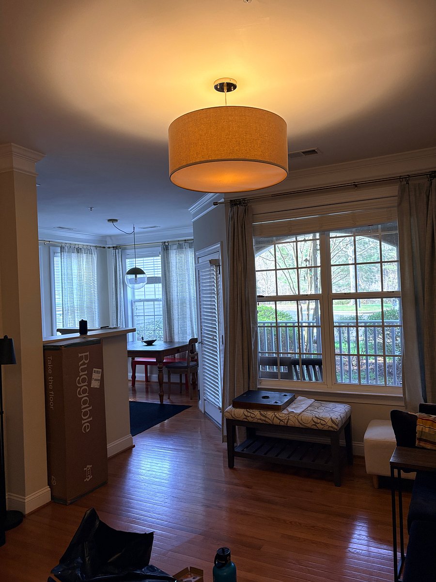 This space is SO CLOSE to being finished, here's a view from the living room towards the dining room, and overlooking the parking lot and reserved spot for just you!