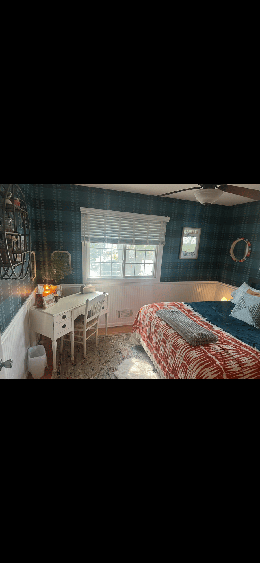 Bedroom 2 with workspace, queen bed and a reading/game closet