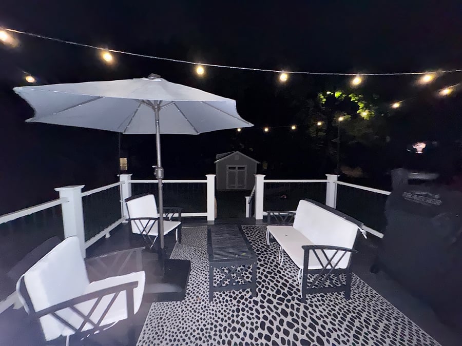 Relax outdoors in the evening with cozy lighting