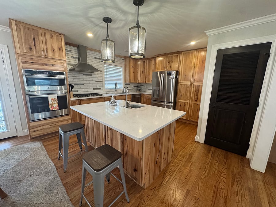 Island in Kitchen, large pantry cabinet, built in oven and microwave, gas stove top.