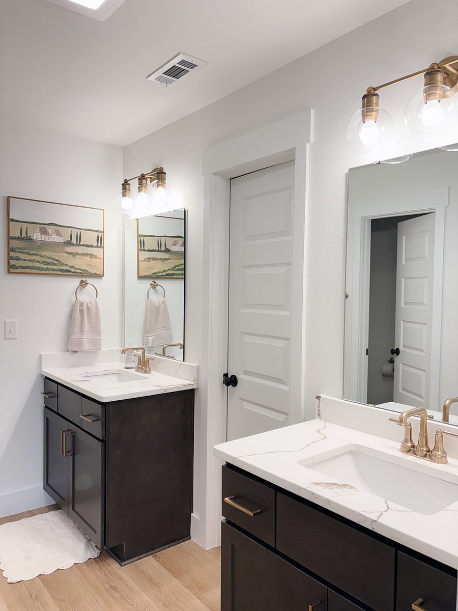 separate double vanity in primary bathroom