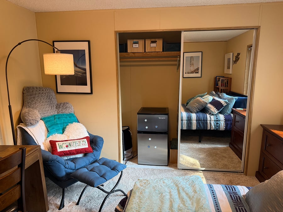 Closet Left Side: small fridge/freezer, sheets, towels, hamper, collapsable laundry basket, extra bins for your use.