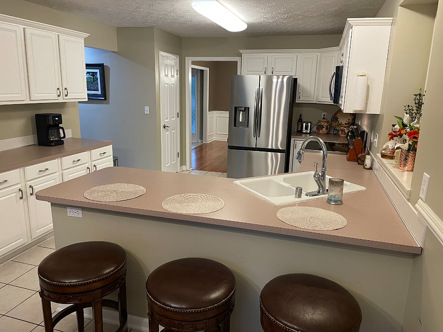 Kitchen with all new stainless steel appliances.