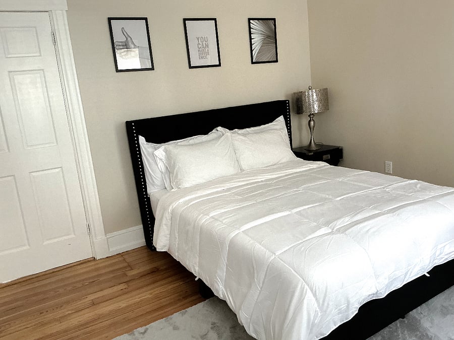 Bedroom 3: Full bed, closet & modern touches for a cozy, stylish nights rest.