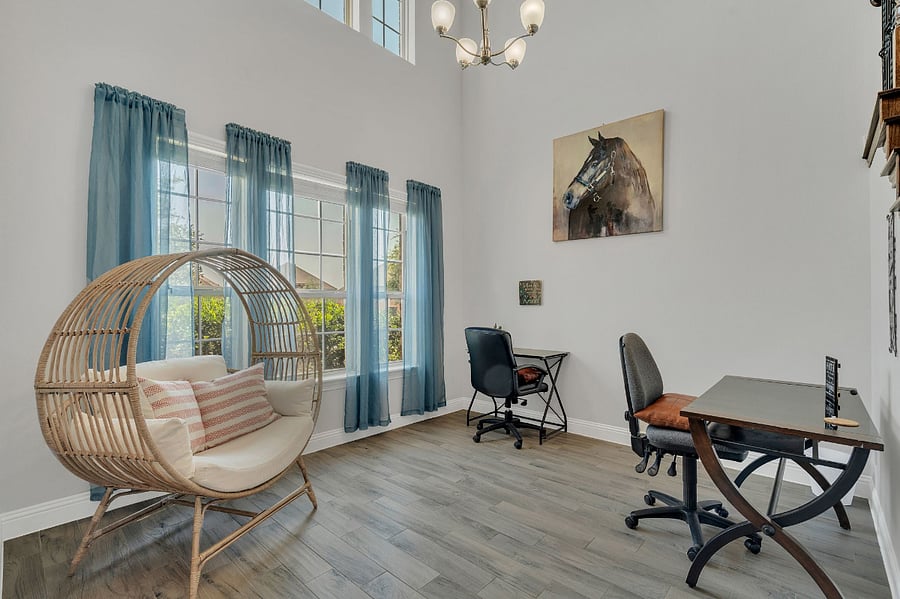 Spacious front entry with soaring ceilings, abundant natural light, and a dedicated office featuring two workstations. This home includes four total workspacestwo in the front office, one in the master suite, and one in the upstairs loft/game roomproviding flexibility for remote work and study.