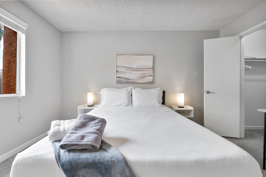 Peaceful bedroom with a plush queen bed and soft linens.