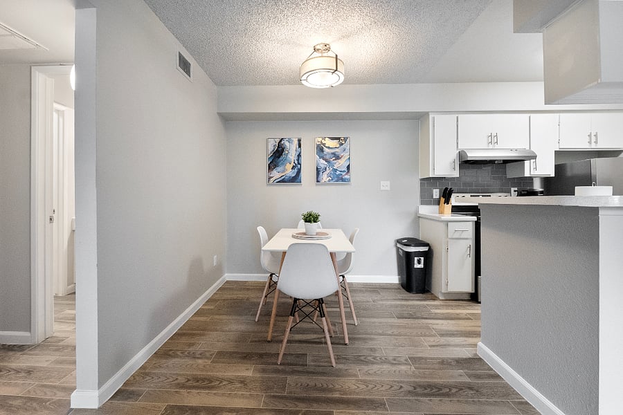 Chic dining space, filled with natural light.