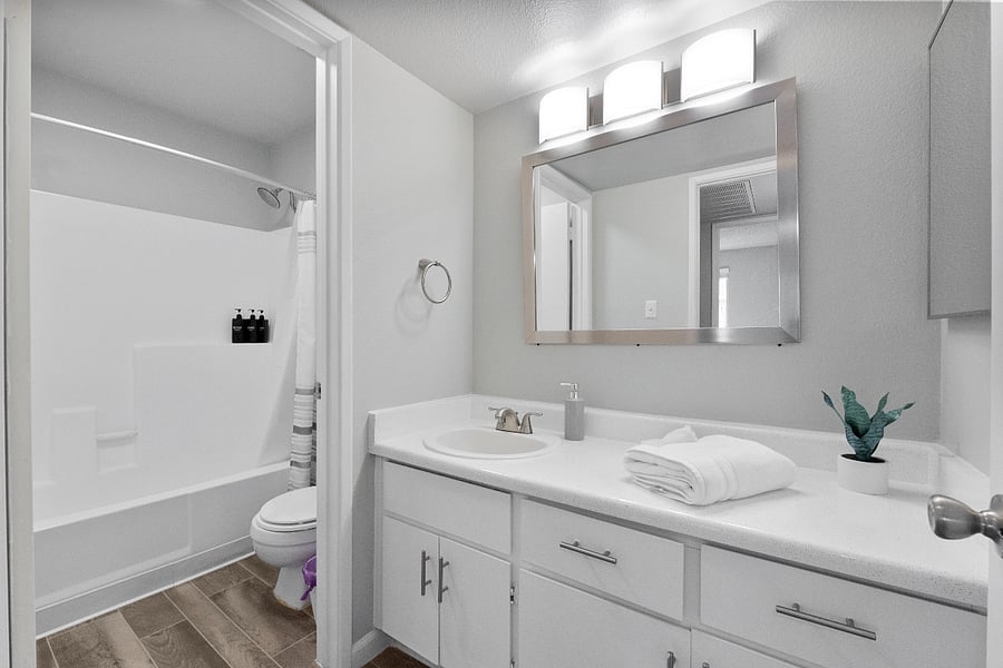 Sleek bathroom with a walk-in shower.