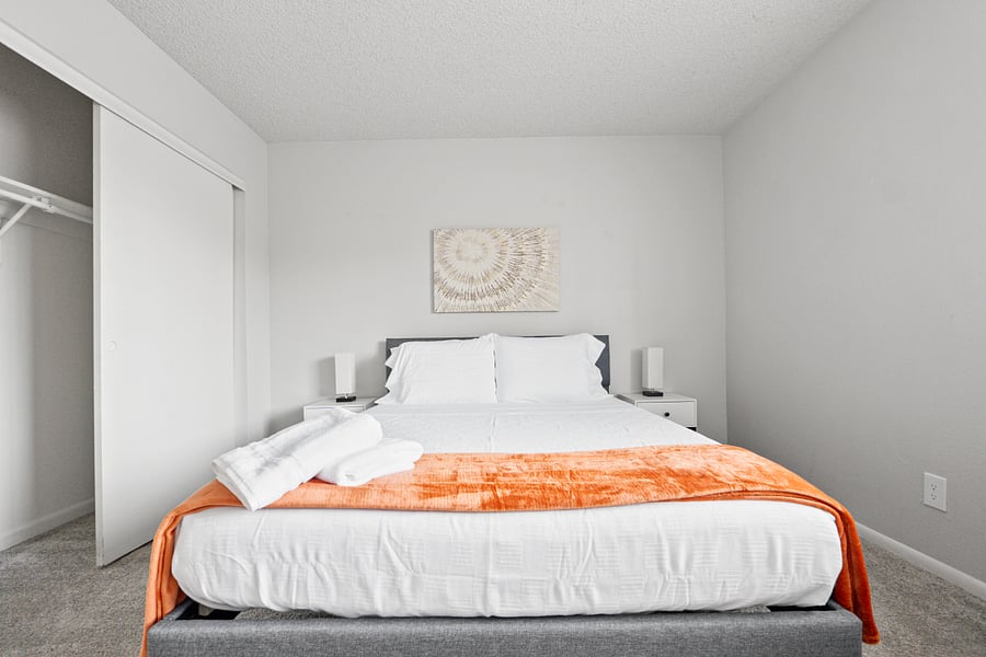 Peaceful bedroom with a plush queen bed and soft linens.