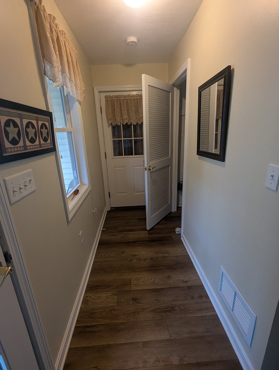 Front Hall closet, door to house