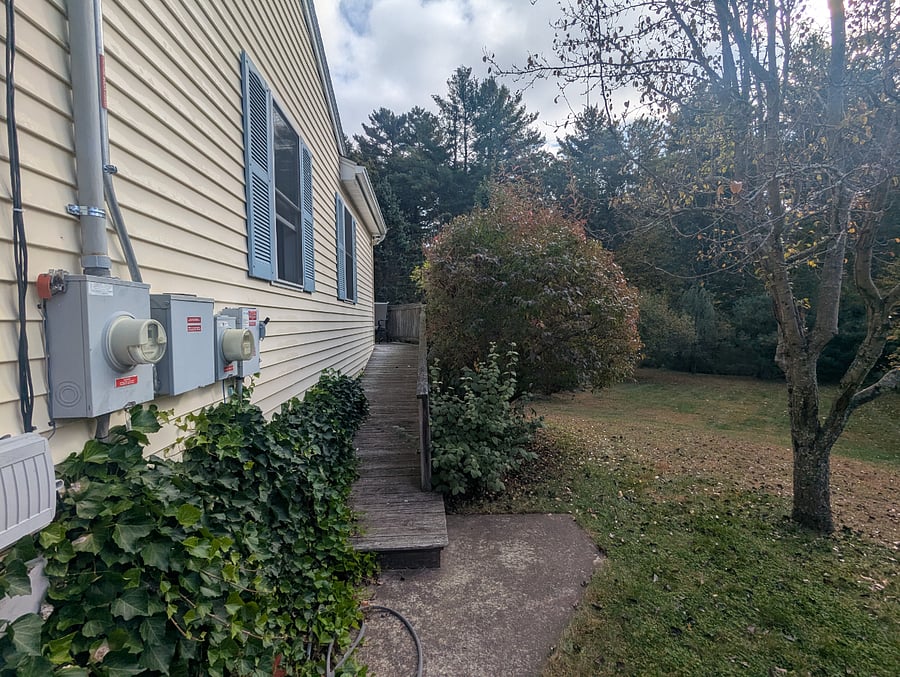 Ramp beside apartment to deck
