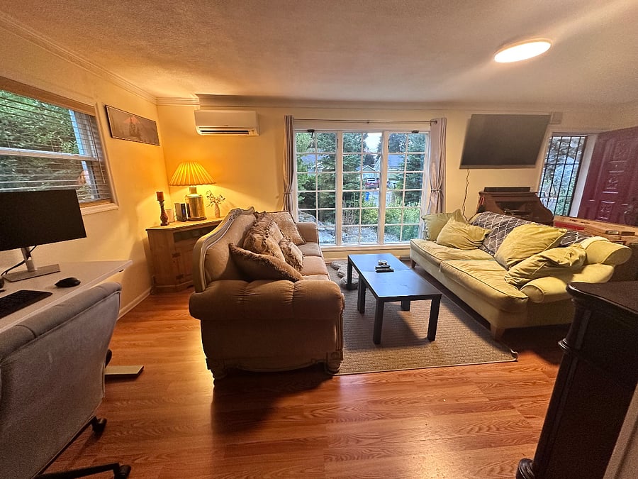 2 large sofas, 55" Smart TV with pullout arm, auto heat pump to keep room temperature between 71-74 degrees