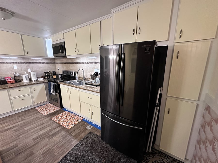 Full Kitchen (no Dishwasher) with gas BBQ Grill outside.