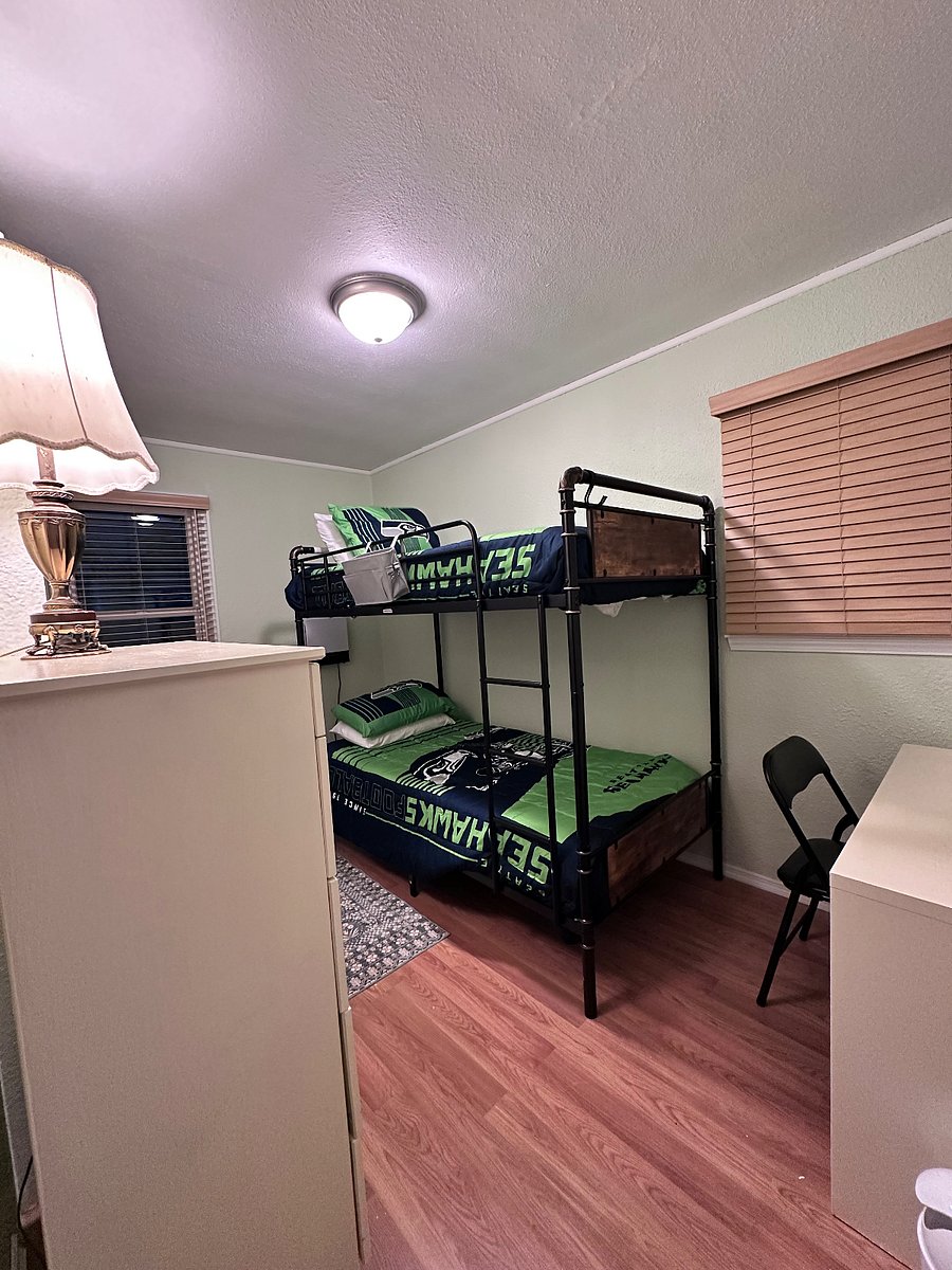 2nd Bedroom with Twin Bunk Beds (supports up to 300 lbs. each bed), with Desk and beanie seats by the windows