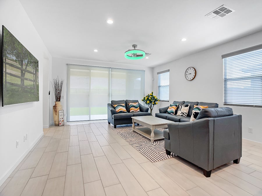 Open concept living space,  75" smart TV with Netflix, ceiling fan