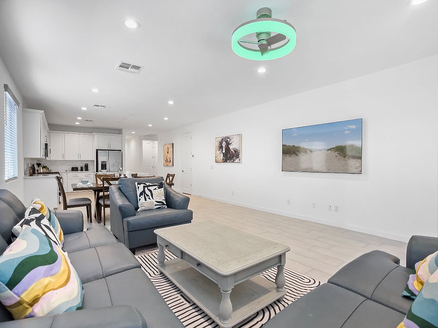 Open concept living space,  75" smart TV with Netflix, ceiling fan
