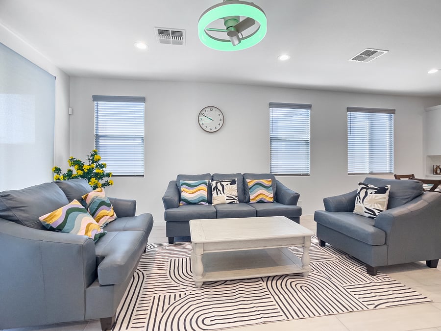 Open concept living space,  75" smart TV with Netflix, ceiling fan