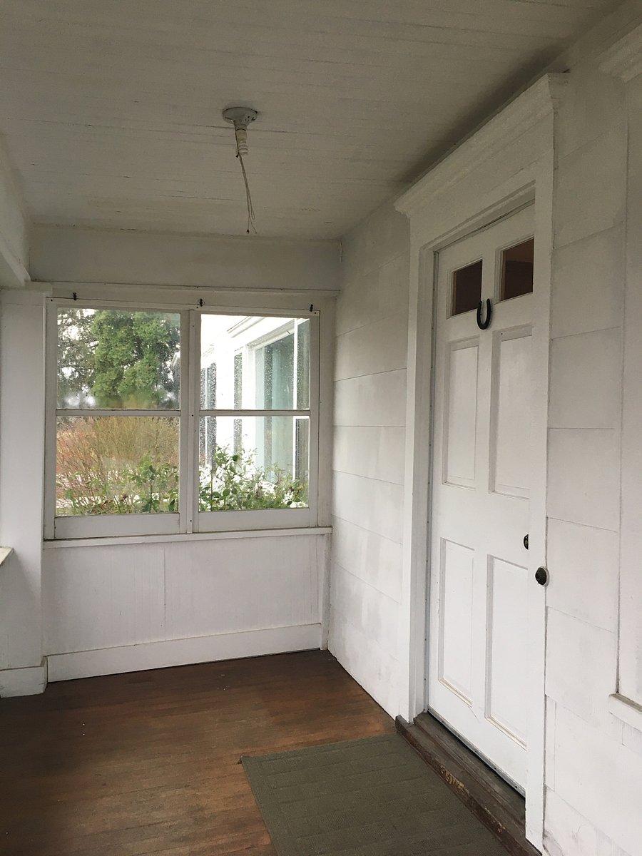 Main entrance through screened porch