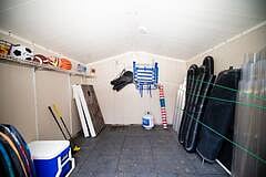 Big outdoor shed with beach supplies, games and pool items