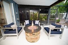 Fire Pit Lounge in screened in pool area