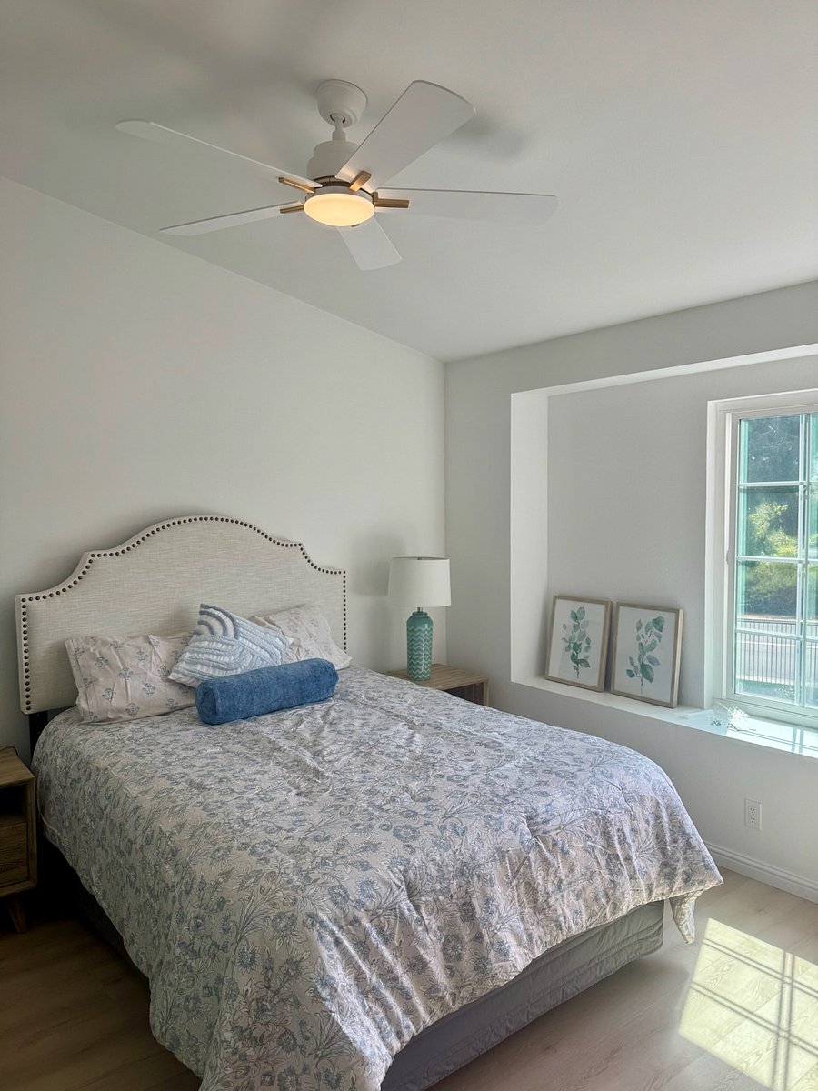 Enjoy ocean breeze and sunset views from master bedroom with queen bed, and private en-suite with tile shower.