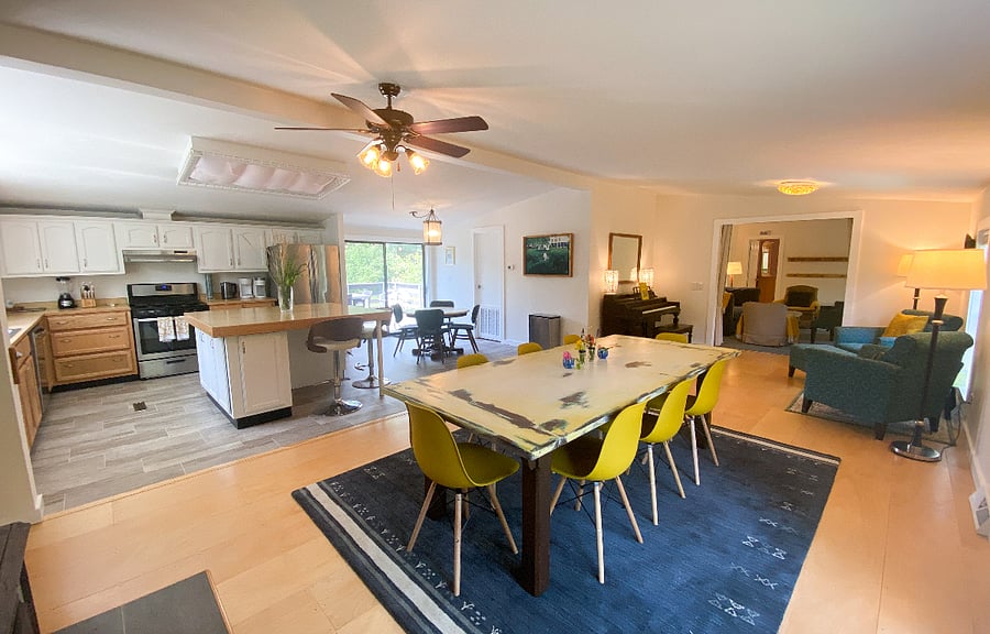 Dining area looking east towards the living quarters and north towards the sliding door to the back deck
