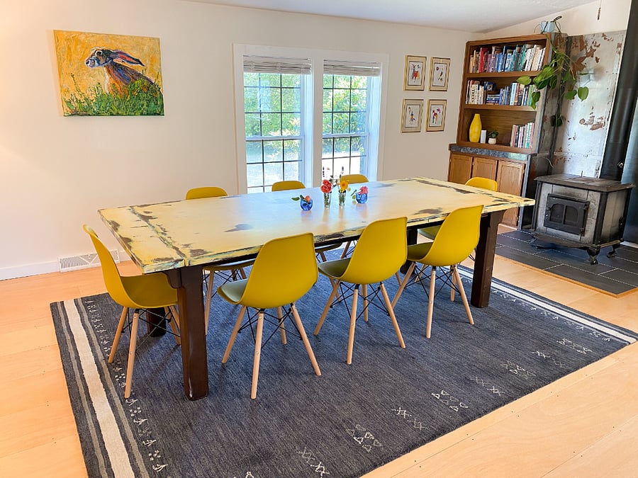 Dining area / conference table for meetings.

(Note that the woodstove is not operational. Out of order.)
