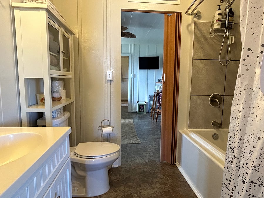 Bathroom with access from the Living Room and Bedroom 1