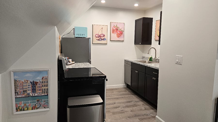Full well-stocked kitchen has everything you need to prepare, store, and serve meals. Note: the oven does not work but the stovetop does and there is a combo toaster oven - air fryer.