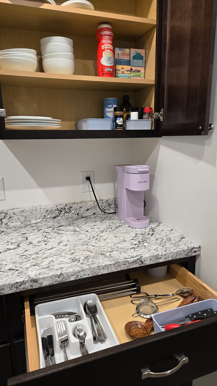 Keurig. Kitchen also has tea kettle and blender.