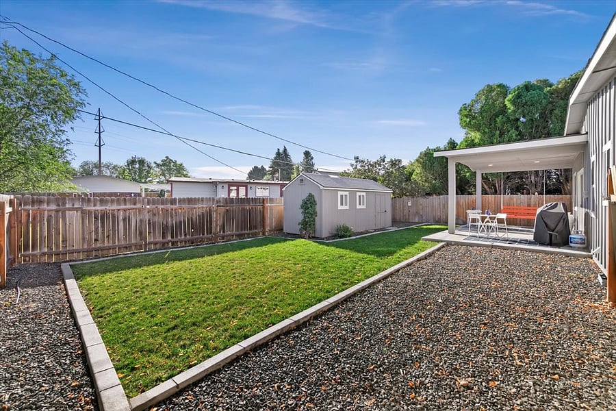 Back yard from carport