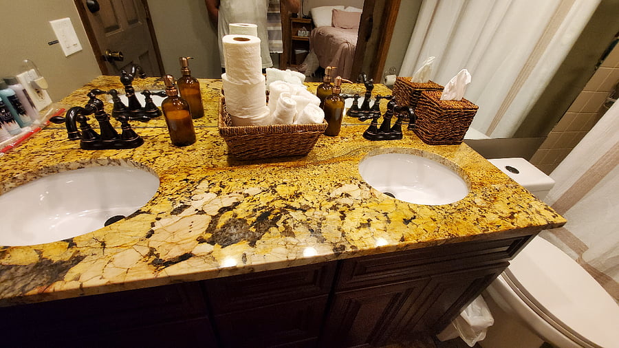 Private bath with double granite sinks!