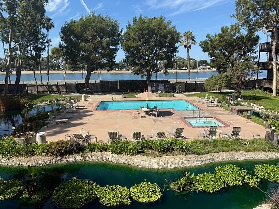 Pool, jacuzzi and lagoon outside bedroom
