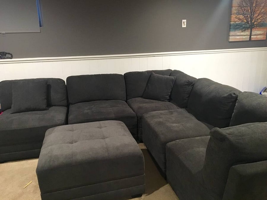 This sectional couch can be arranged in a very different ways.