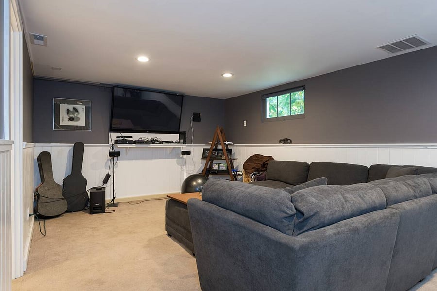 Since this photo was taken, the carpet has been replaced. There is a set of Bose speakers for the tv and I've added a floor lamp for reading.