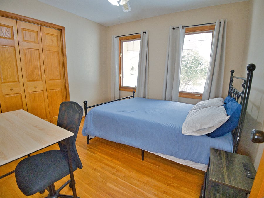 Welcome to your perfect getaway! This charming bedroom offers a cozy full bed, plush linens, warm decor, and plenty of natural light. Perfect for work or leisure, it's a serene retreat with all the essentials for a restful stay.